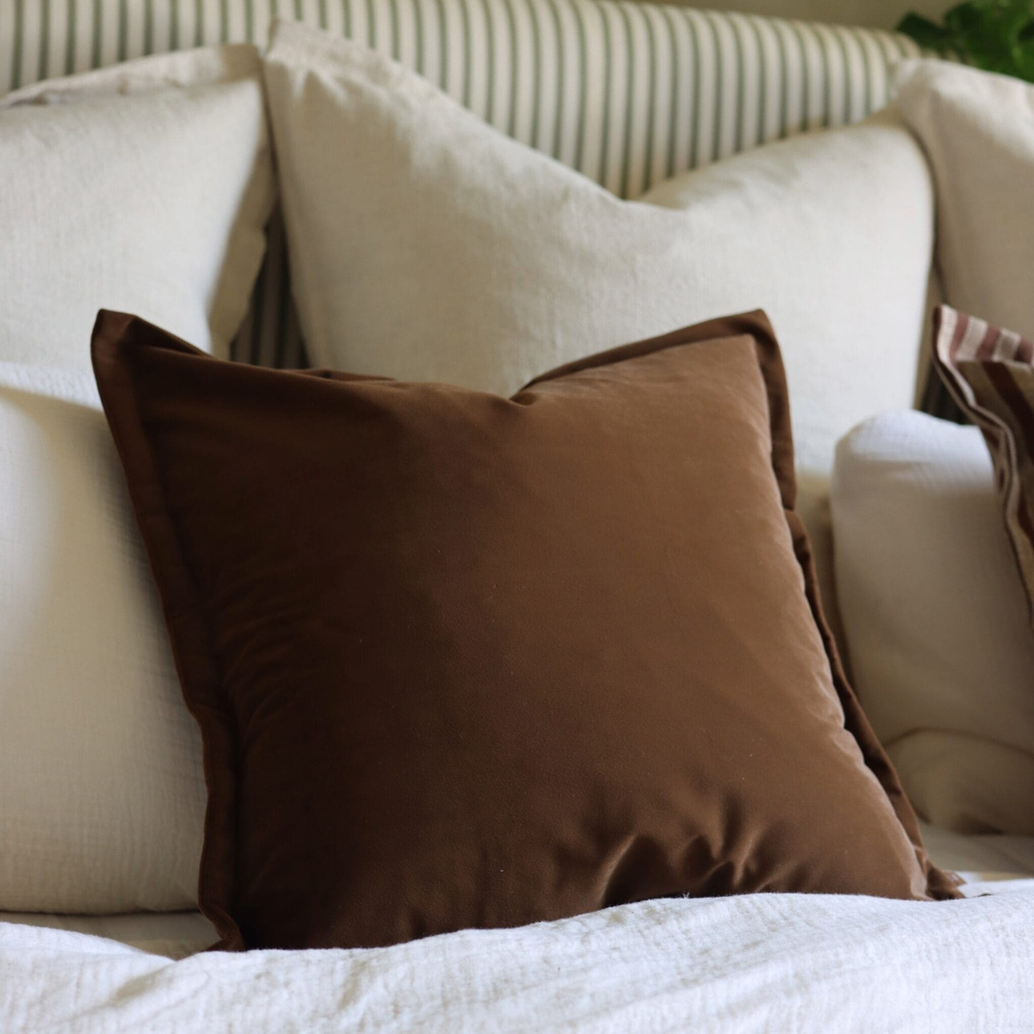 emma dark brown velvet cushion