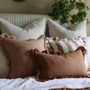 hallie rust ruffle cushion 50x30