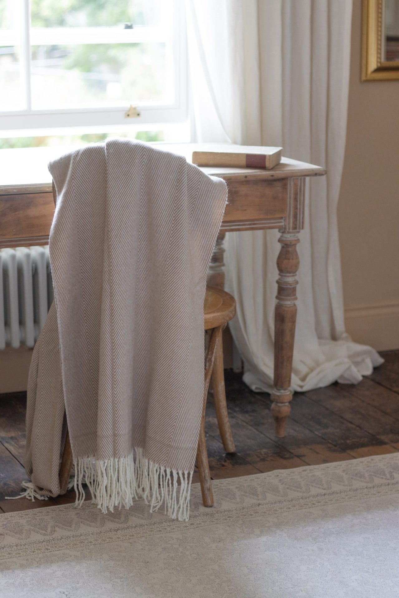 brown tassel throw with herringbone pattern