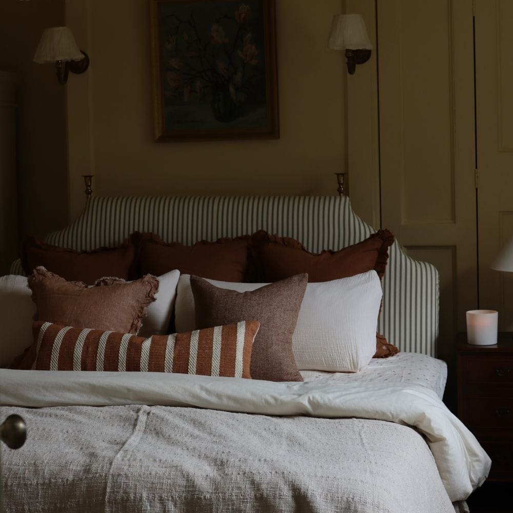 india rust rope stripe bolster cushion