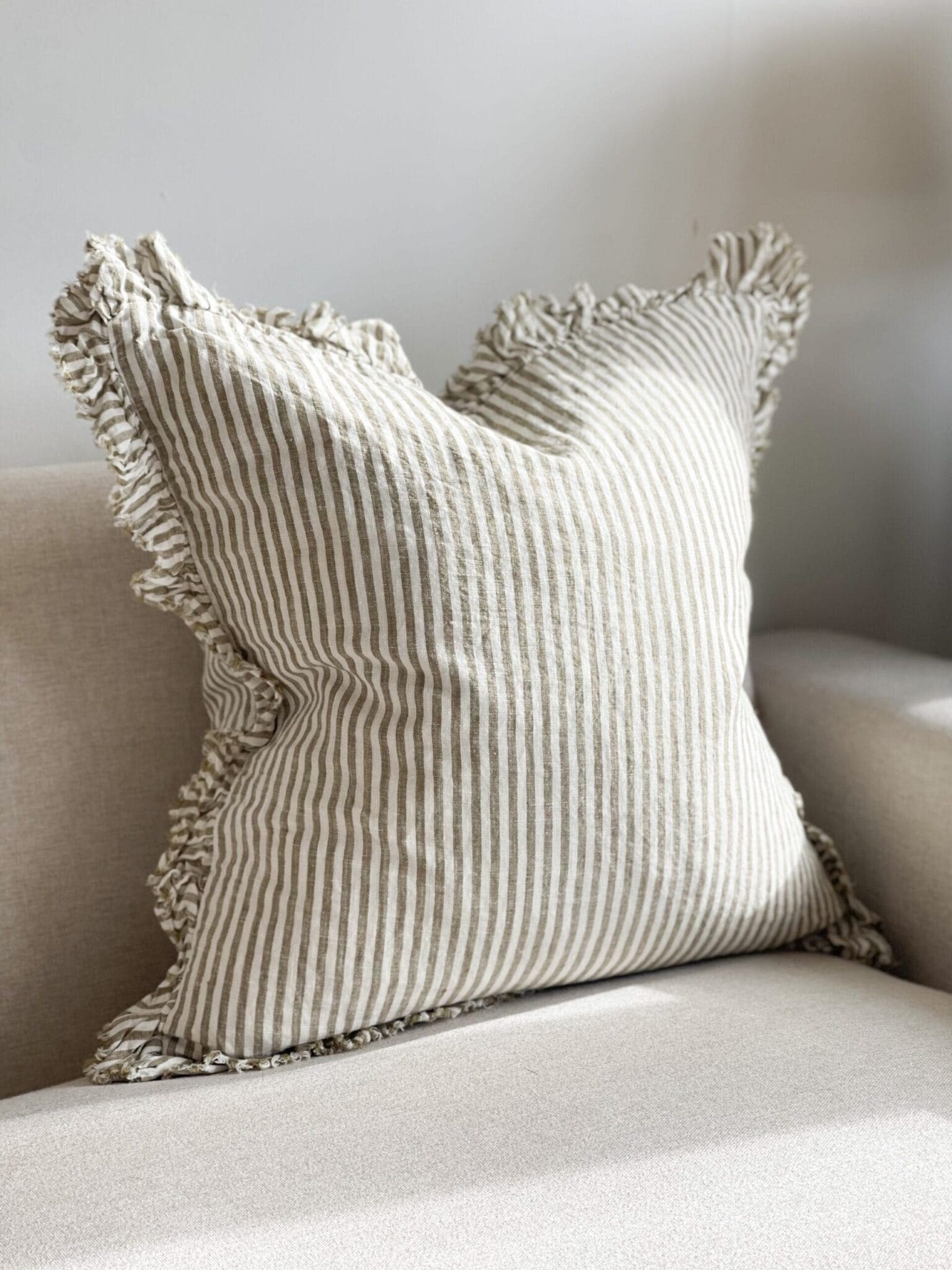 hallie olive stripe ruffle cushion