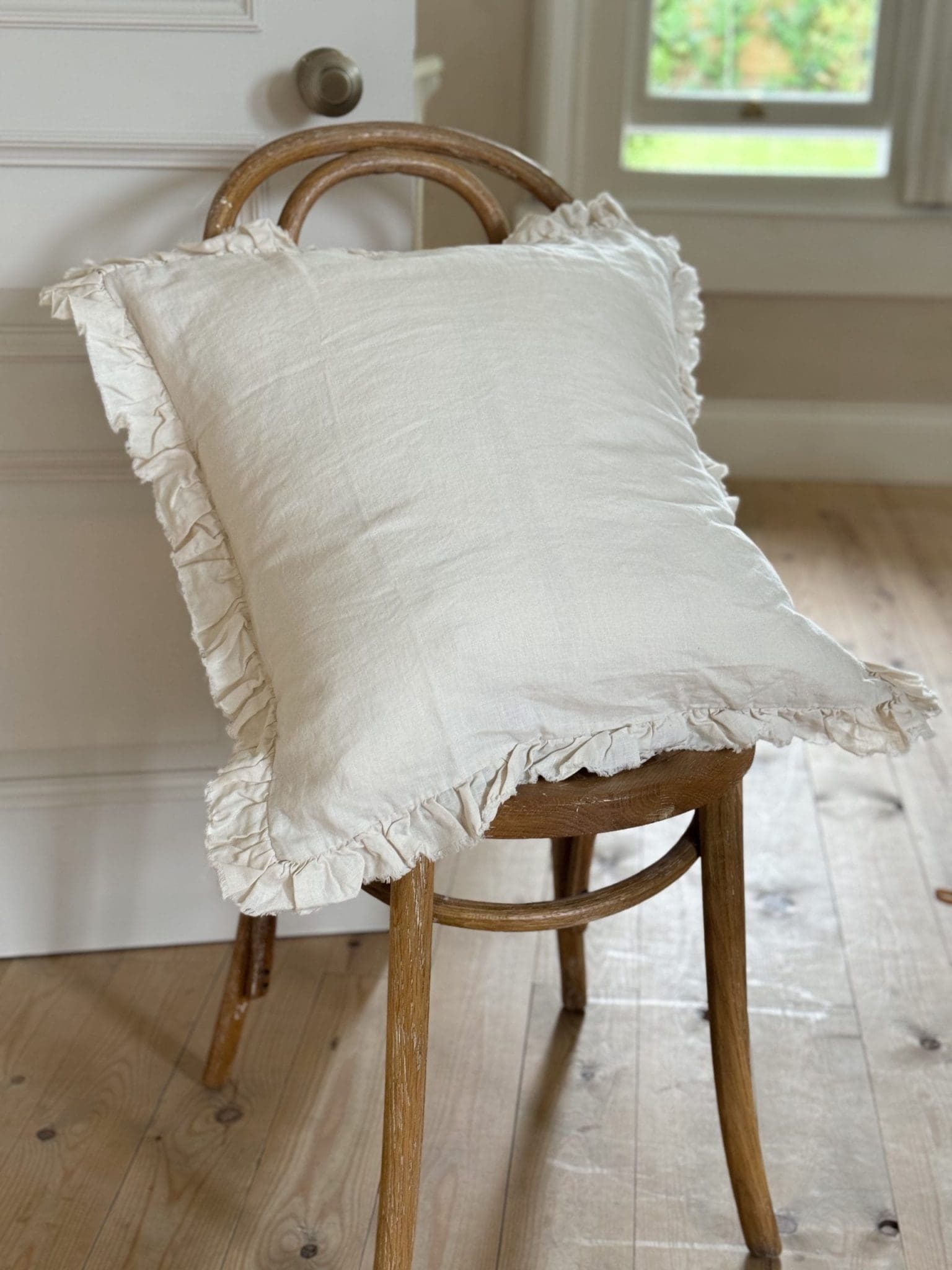 hallie cream ruffle cushion